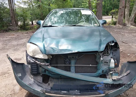 2000 Honda Civic Ex z USA, uszkodzony, nr VIN 1HGEJ8649YL065758